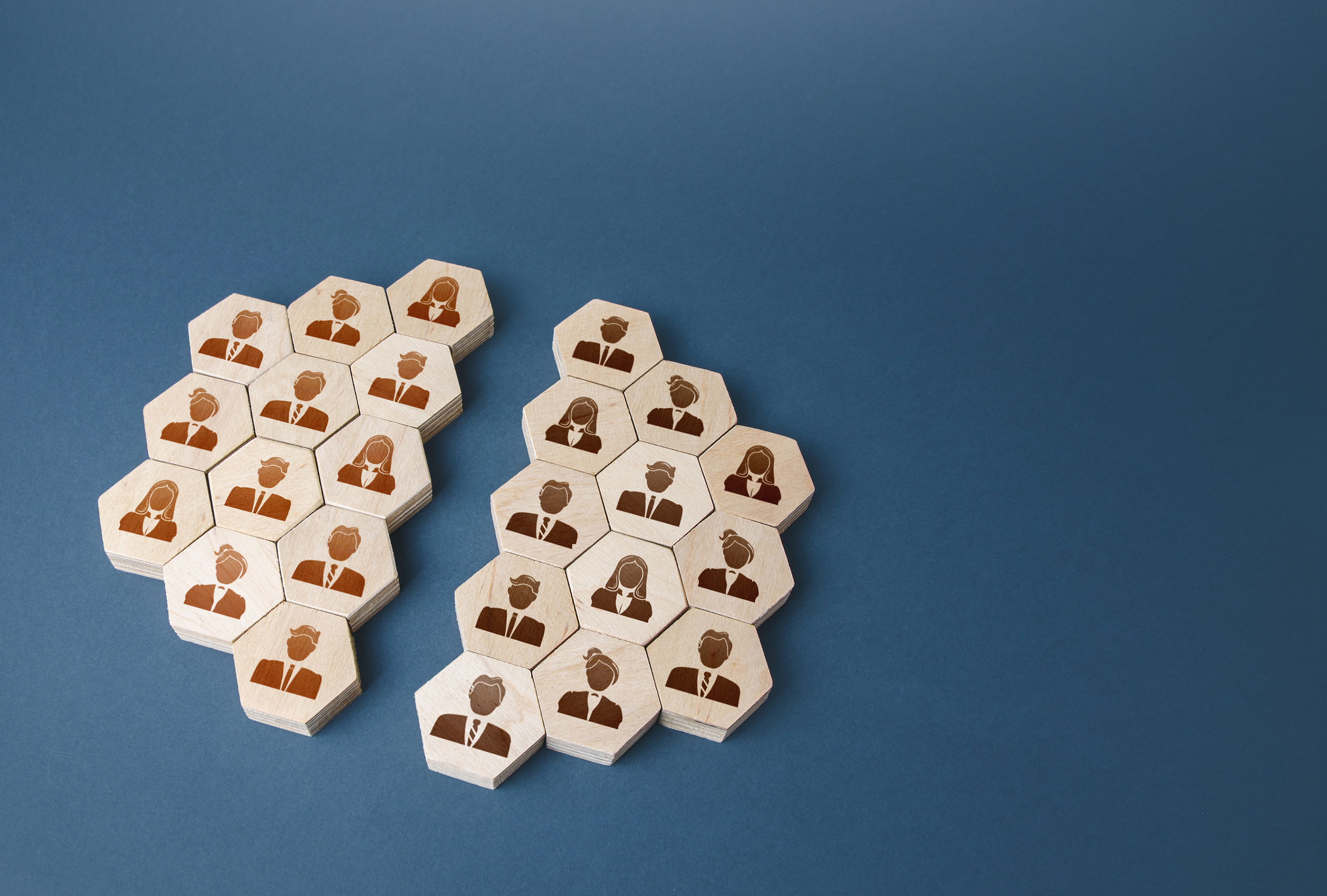 Decorative image of wooden blocks with people on them.