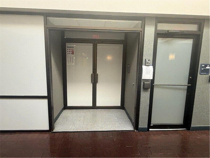 Image of unmarked door for the hidden court room.
